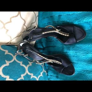 Giuseppe Zanotti Black Heels with Gold Accents